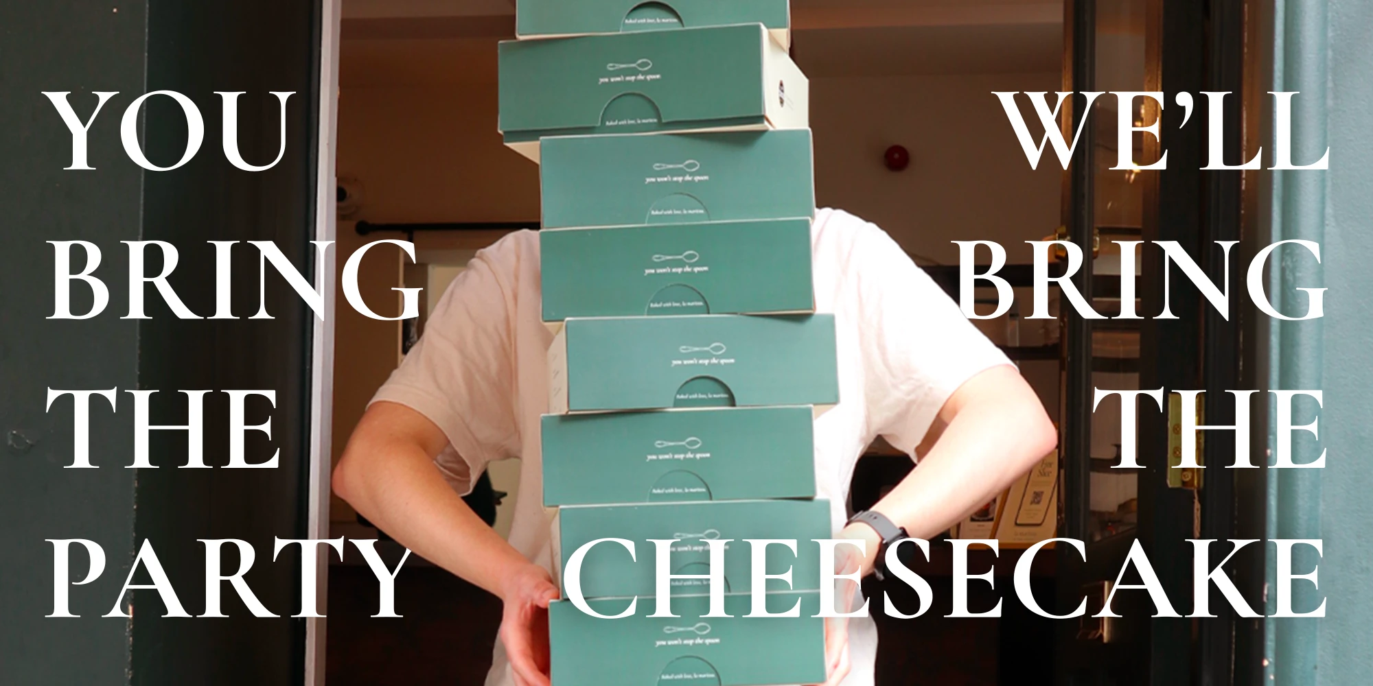 You bring the party, we'll bring the cheesecake: a stack of La Maritxu boxes carried through a doorway