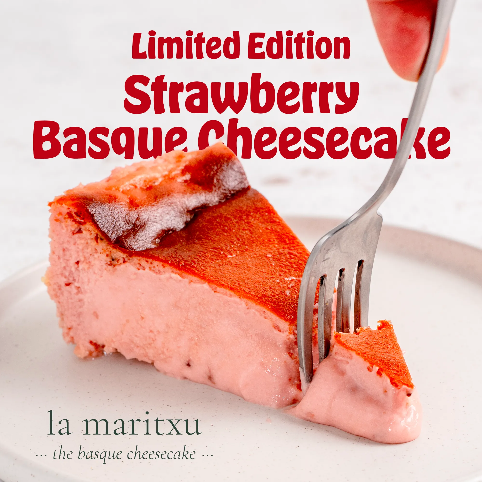 Slice of strawberry Basque cheesecake with a fork lifting a bite