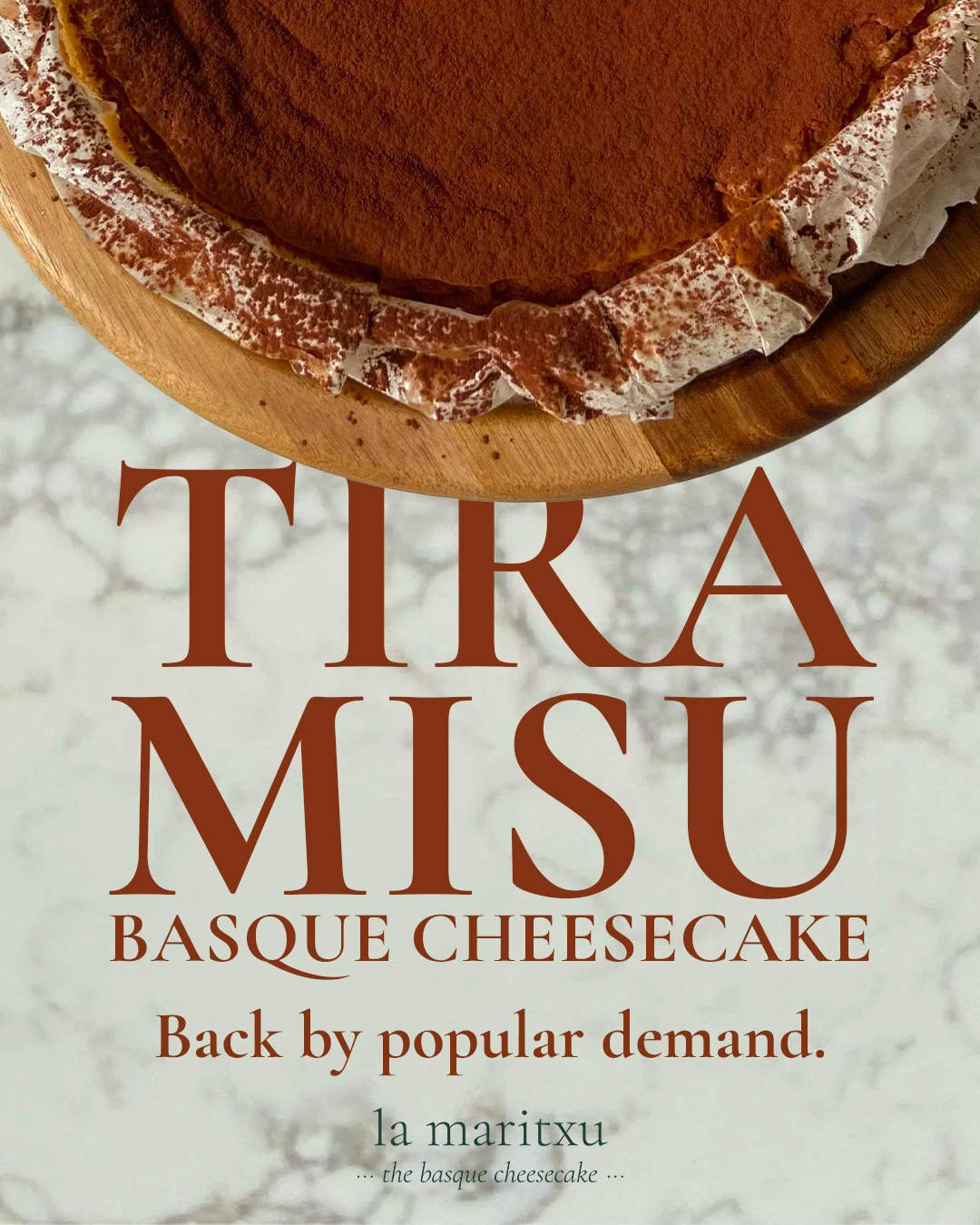Tiramisu Basque cheesecake dusted with cocoa, back by popular demand